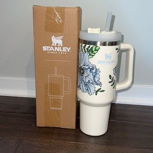 New limited edition cream floral 40 oz stanley quencher. Comes in original box.